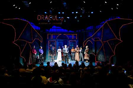 Dacre Stoker (Center) and the company of DRACULA, A COMEDY OF TERRORS. photo by Mettie Ostrowski